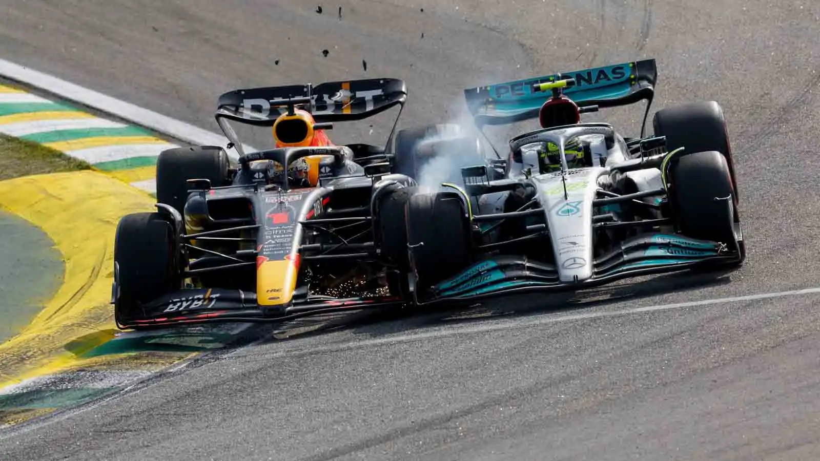 Max Verstappen and Lewis Hamilton crash at Turn 2. Interlagos November 2022.