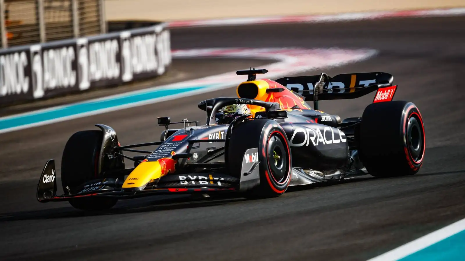 Max Verstappen's Red Bull exits a corner in Abu Dhabi. Yas Marina November 2022.