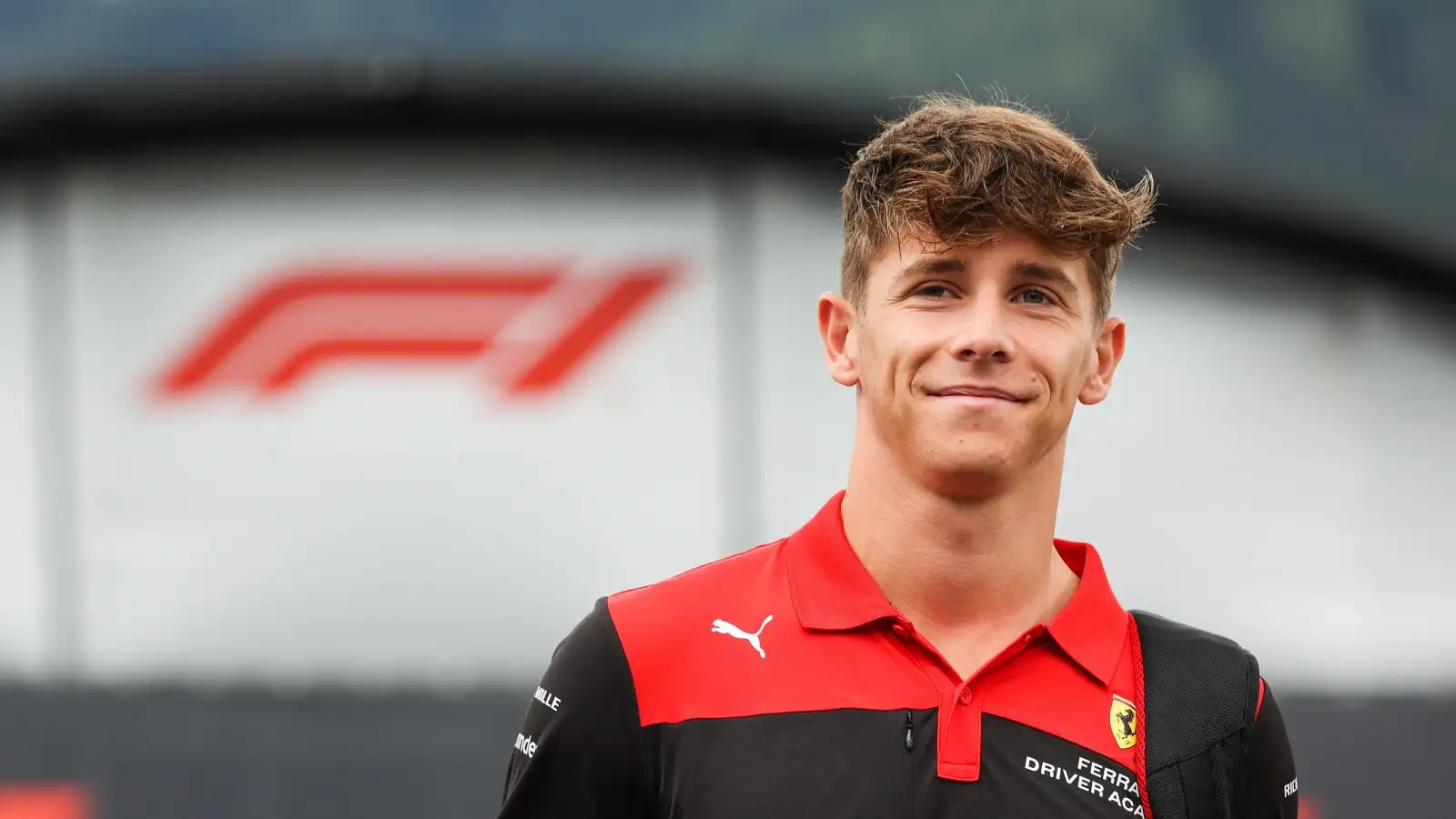 Ferrari junior Arthur Leclerc smiling. Austria, July 2022.