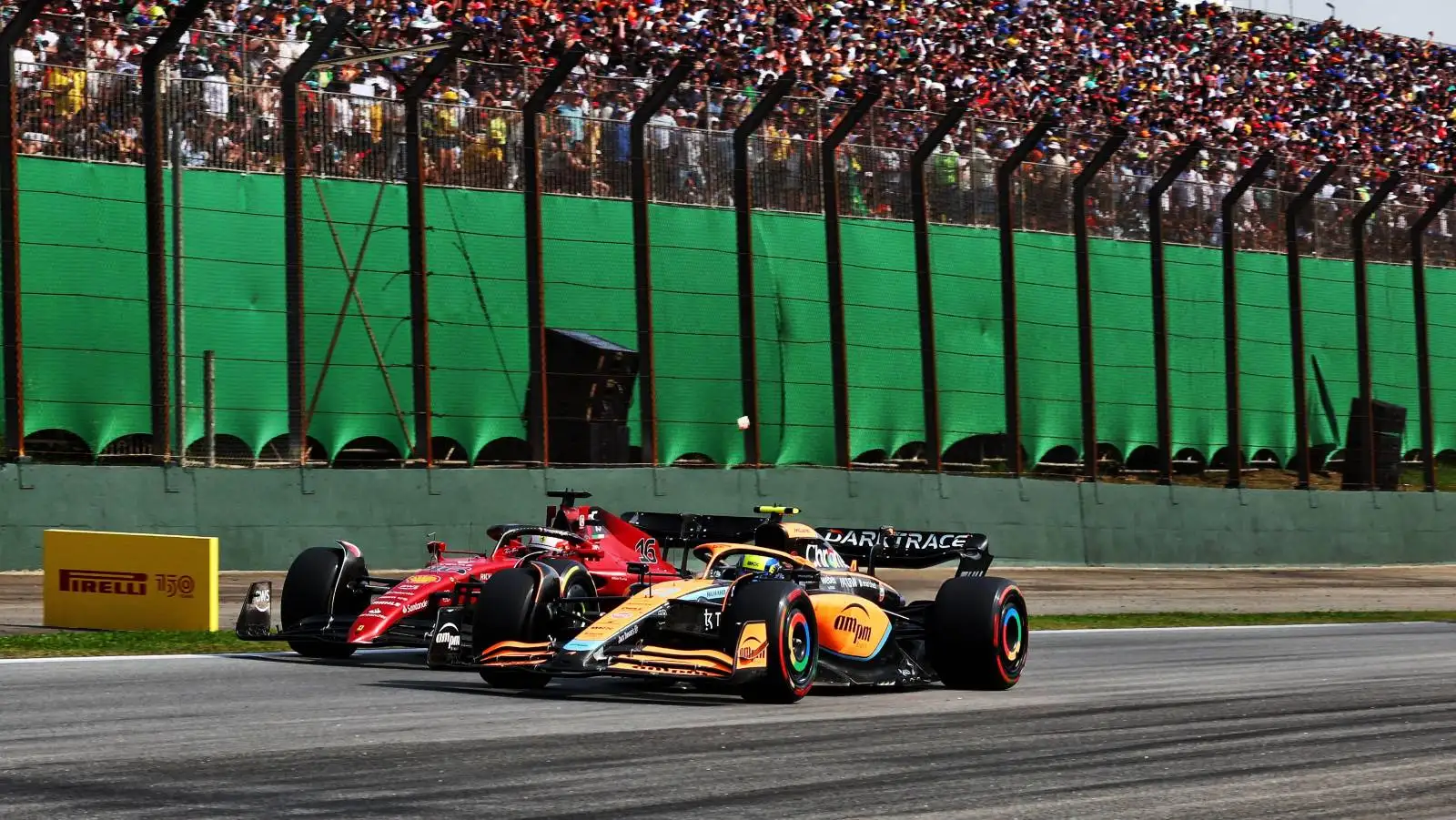 Lando Norris alongside Charles Leclerc. Sao Paulo November 2022.