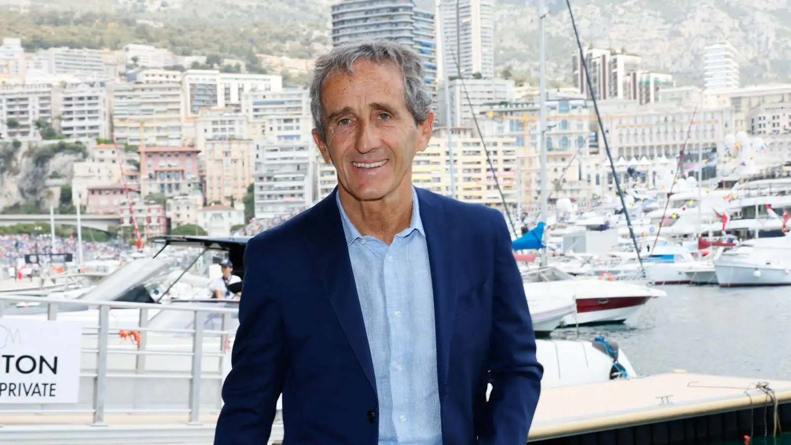 Four-time F1 champ Alain Prost smiling. Monaco, May 2022.
