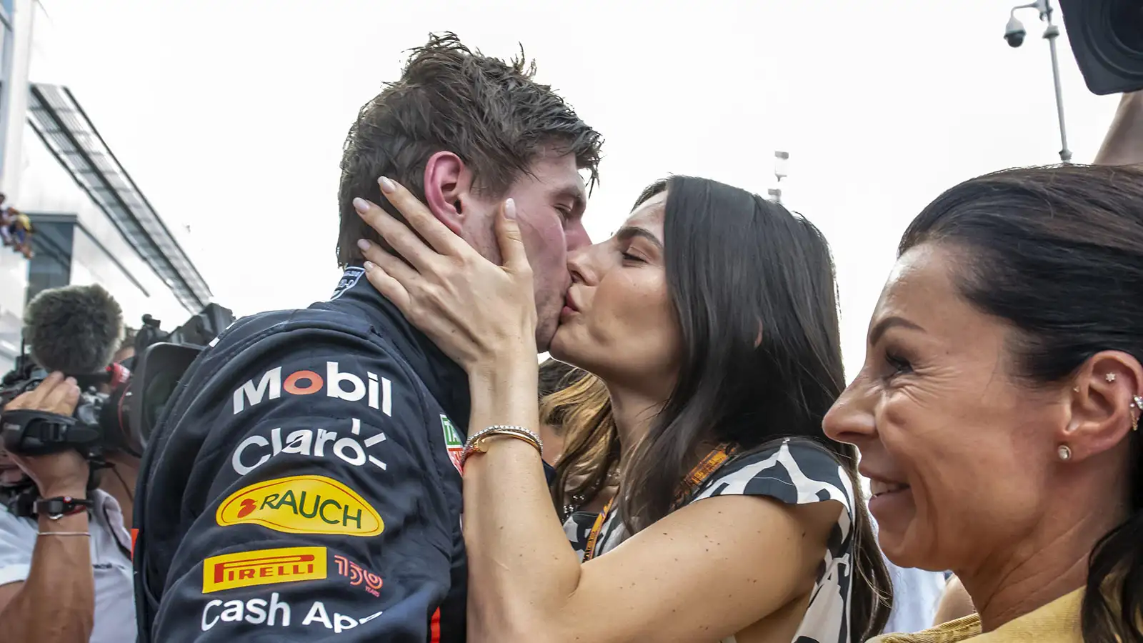 Kelly Piquet and Max Verstappen kiss at the Miami Grand Prix.