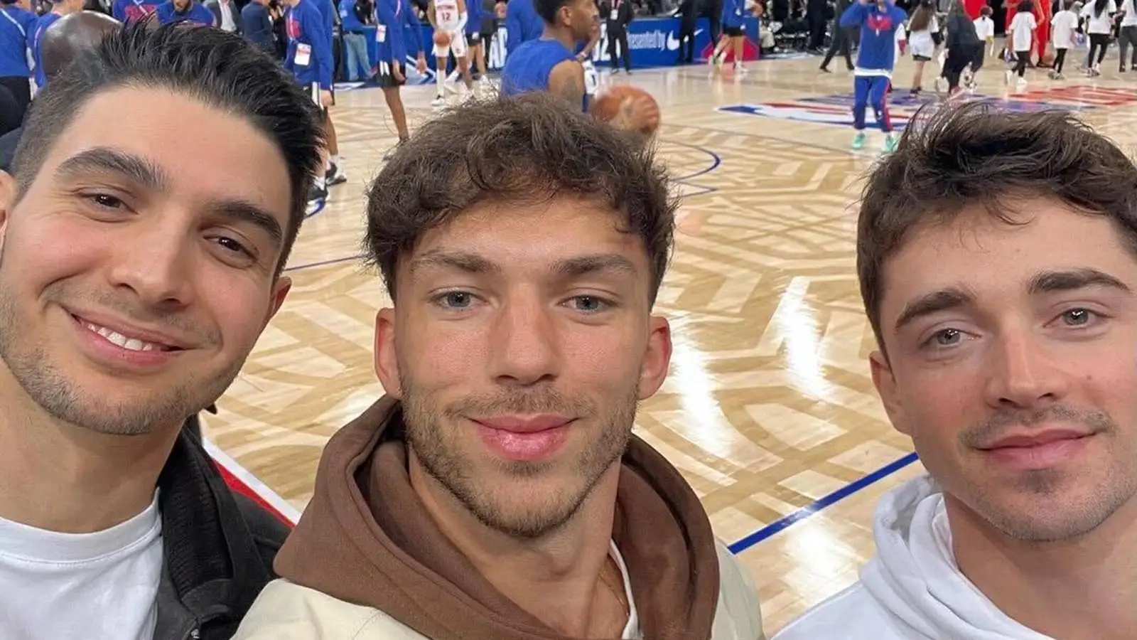 Esteban Ocon, Pierre Gasly and Charles Leclerc attend NBA Paris. January 2023