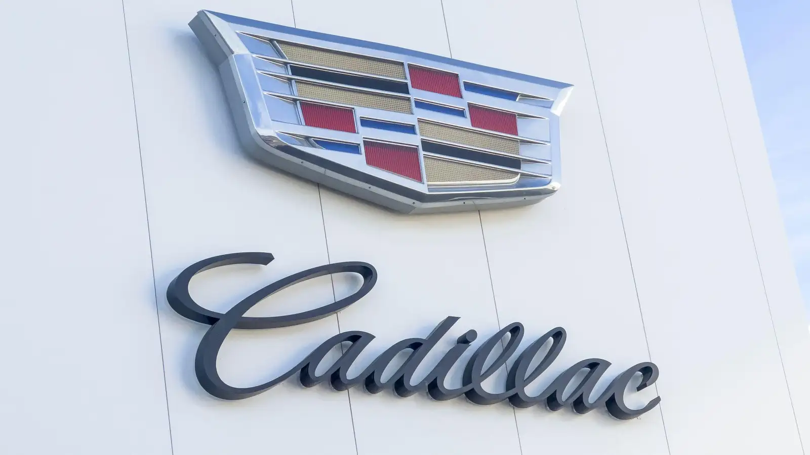 Cadillac dealership building exterior with logo. October 2022.