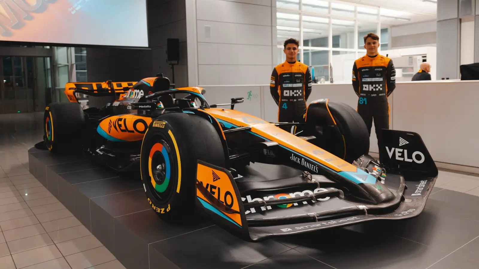 Lando Norris and Oscar Piastri stood next to the MCL60. Woking, February 2023.