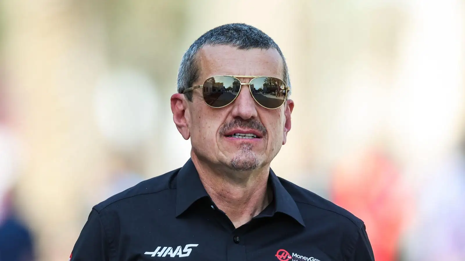 Former Haas team principal Guenther Steiner walks through the F1 paddock in Bahrain.