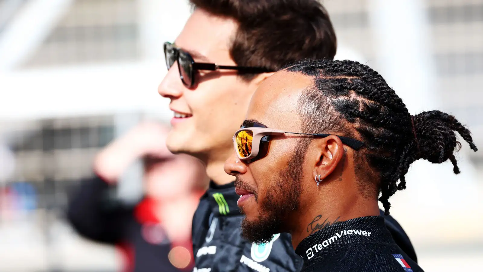 George Russell and Lewis Hamilton smiling in pre-season photo call. Bahrain February 2023