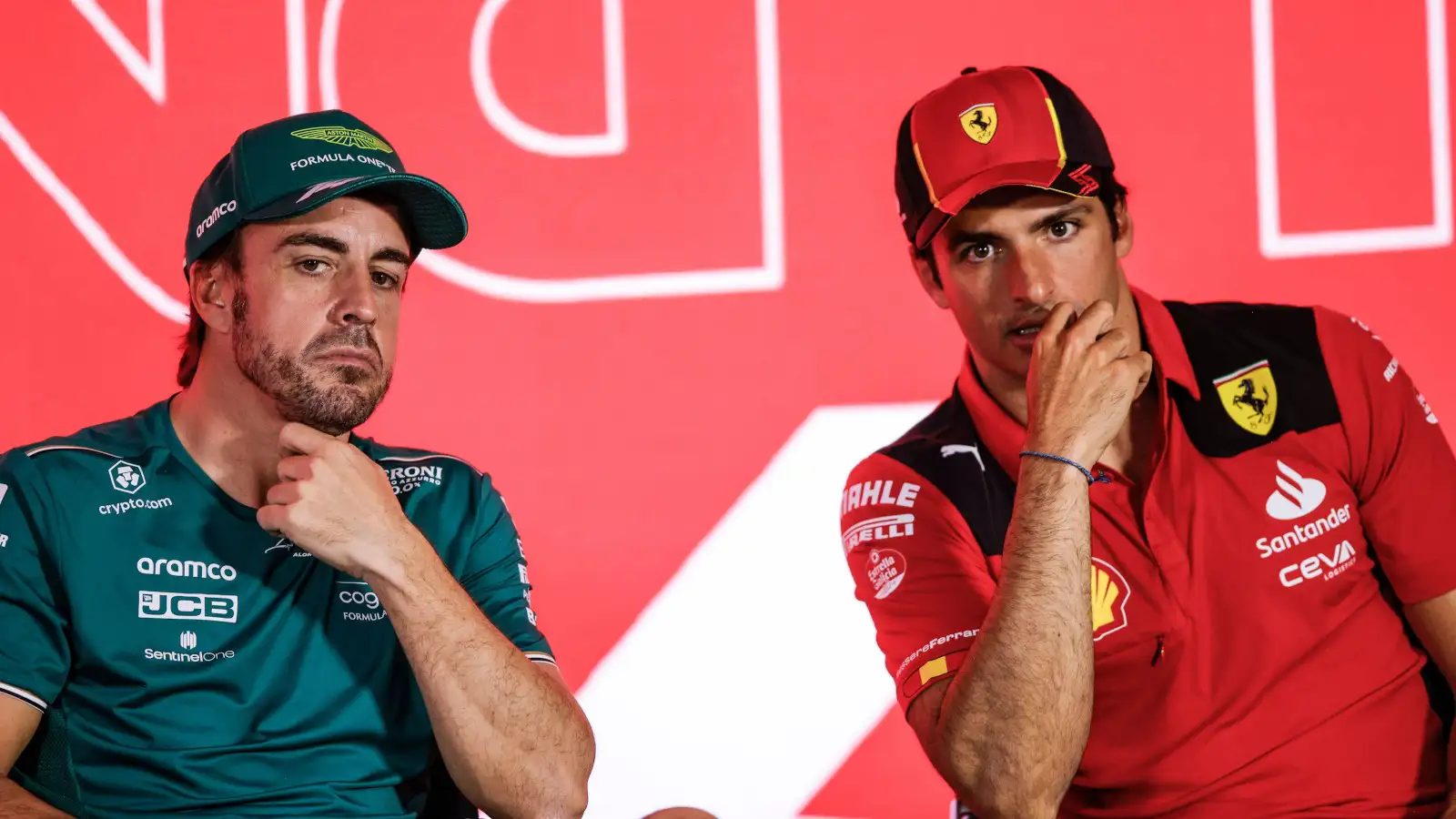 Fernando Alonso and Carlos Sainz speaking in a press conference. Bahrain February 2023