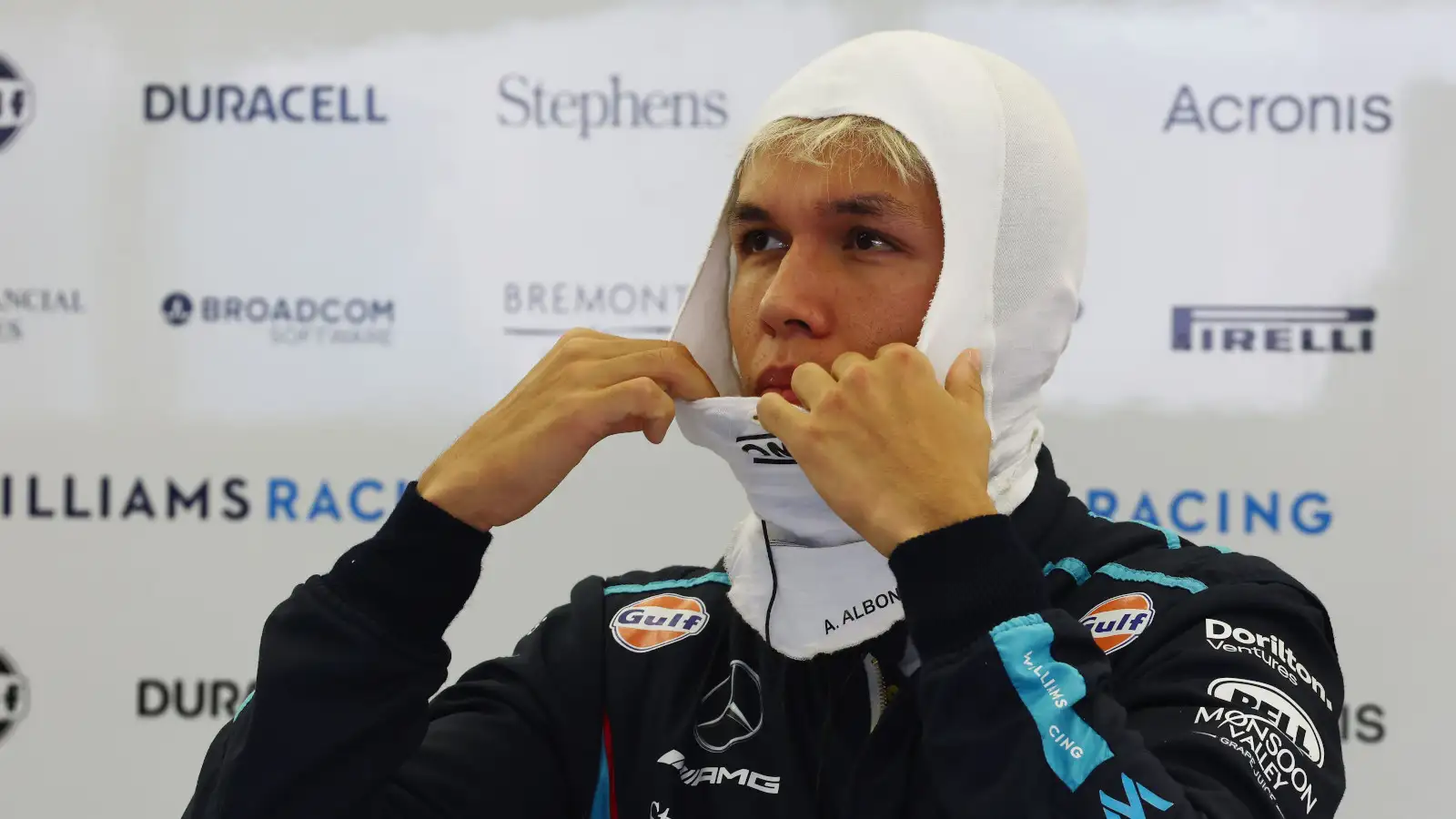 Alex Albon in the Williams garage putting on his fireproofs. Bahrain March 2023