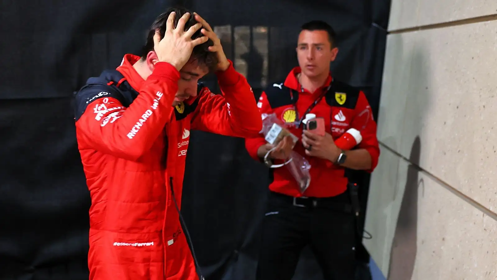 Charles Leclerc, Ferrari, head in hands. Bahrain, March 2023.