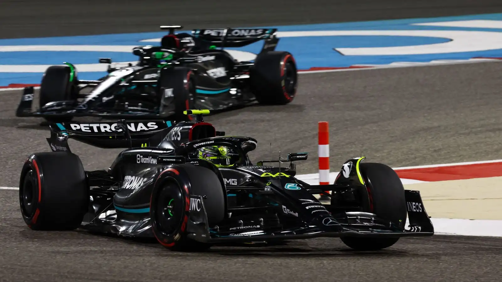 Lewis Hamilton ahead of Mercedes team-mate George Russell. Bahrain, March F1 2023.