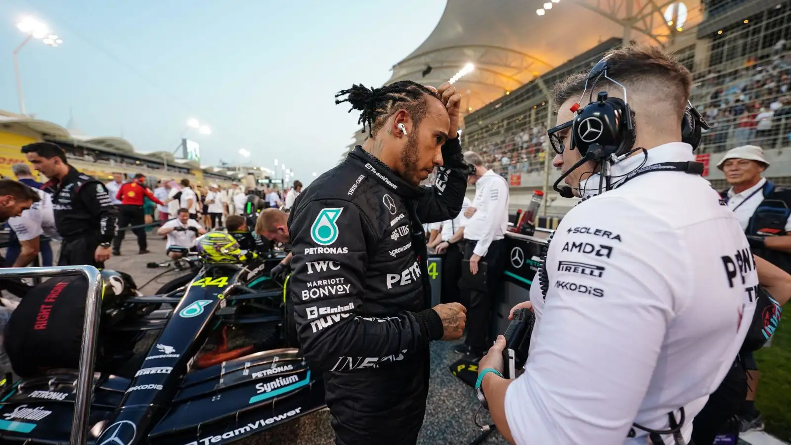 Lewis Hamilton talks to his race engineer Peter Bonnington on the grid before the Bahrain Grand Prix. Bahrain March 2023