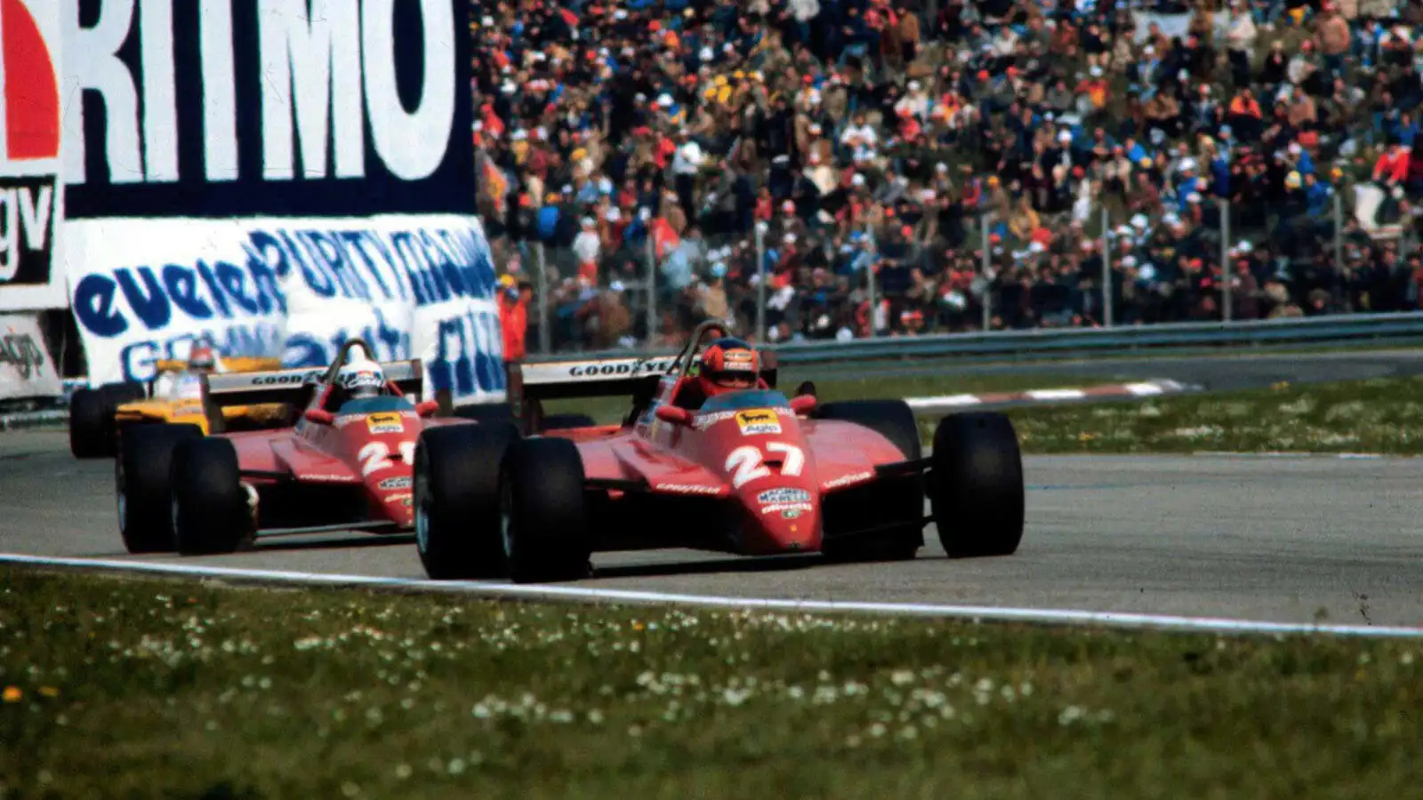 Ferrari's Gilles Villeneuve leads Didier Pironi on track at Imola 1982.
