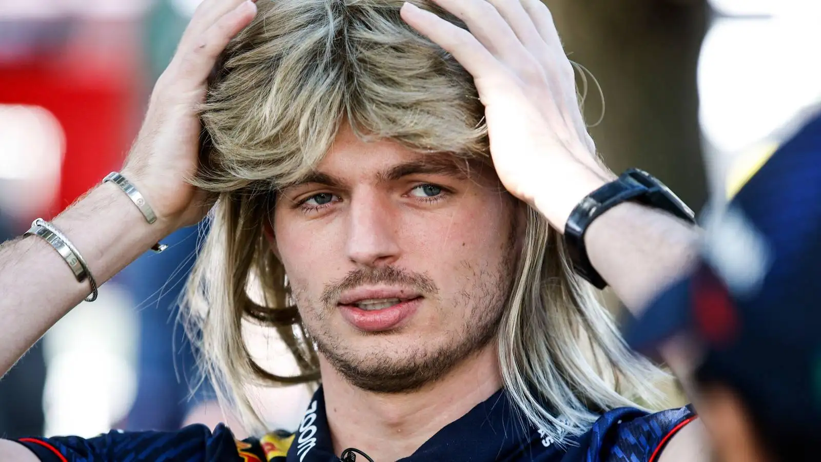 Max Verstappen, Red Bull, wears blonde wig. Australia, March 2023.