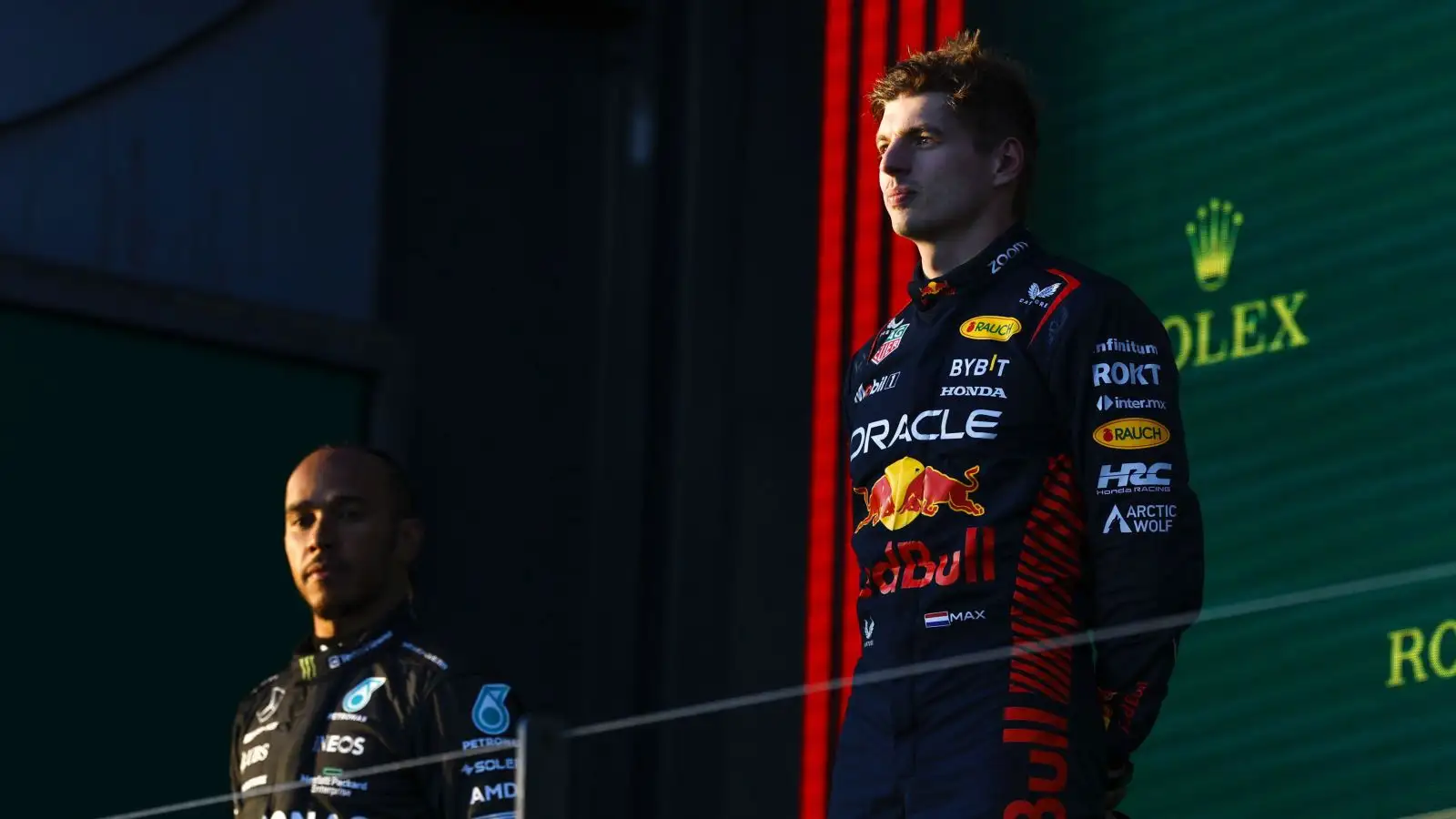 Max Verstappen, Red Bull, and Lewis Hamilton, Mercedes, on the podium. Australia, April 2023.