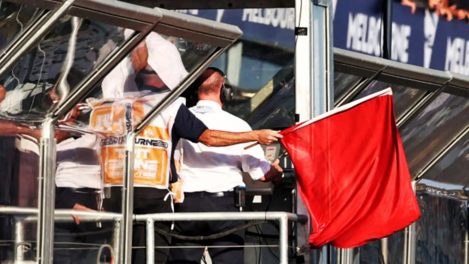 The red flag is waved from the gantry. Melbourne April 2023.