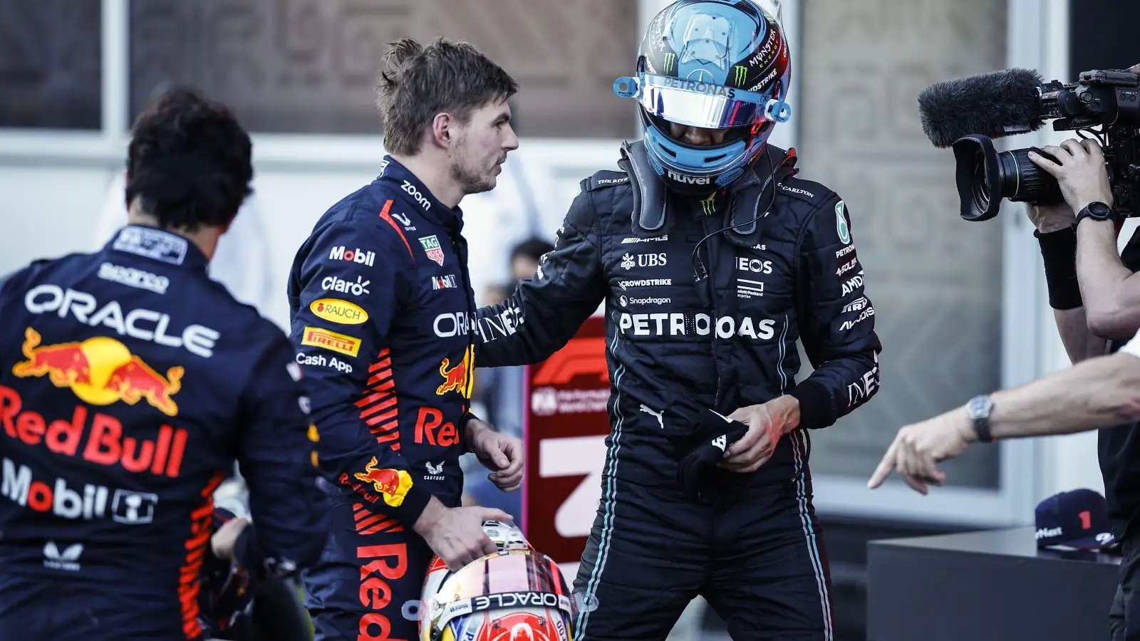 Mercedes driver George Russell with Red Bull driver Max Verstappen at the Azerbaijan Grand Prix. Baku, April 2023.