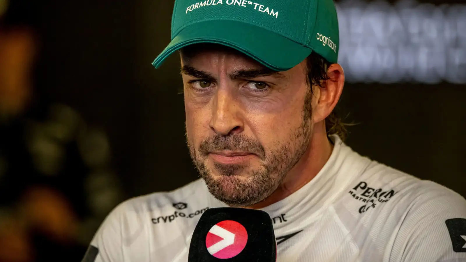 Fernando Alonso stern look speaking to the media. Azerbaijan April 2023