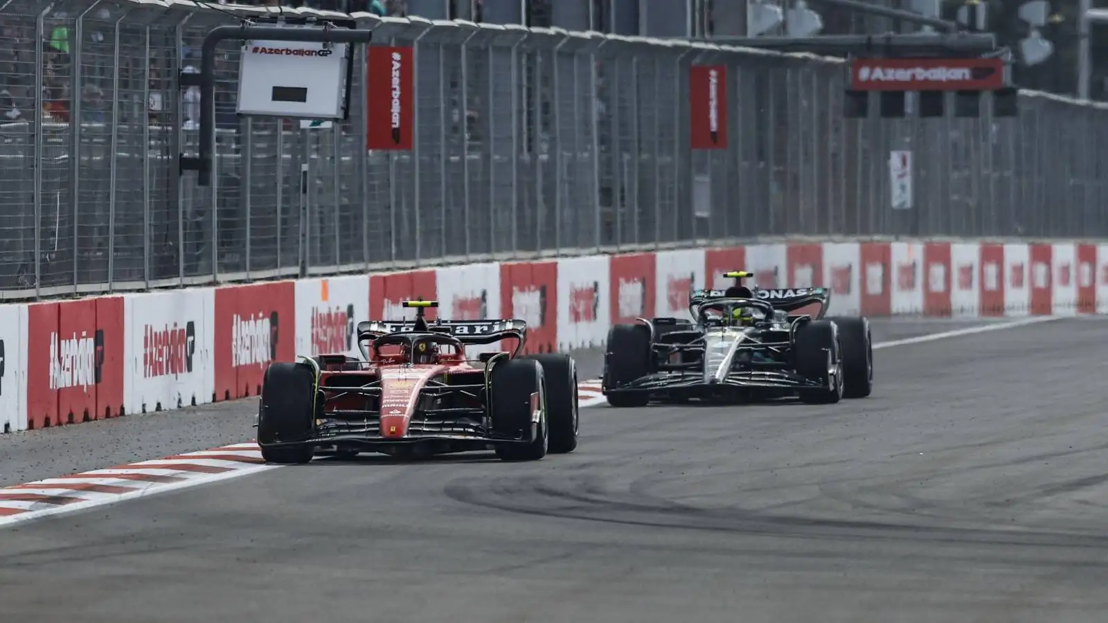 Lewis Hamilton, Mercedes, follows Carlos Sainz, Ferrari. Azerbaijan, April 2023.