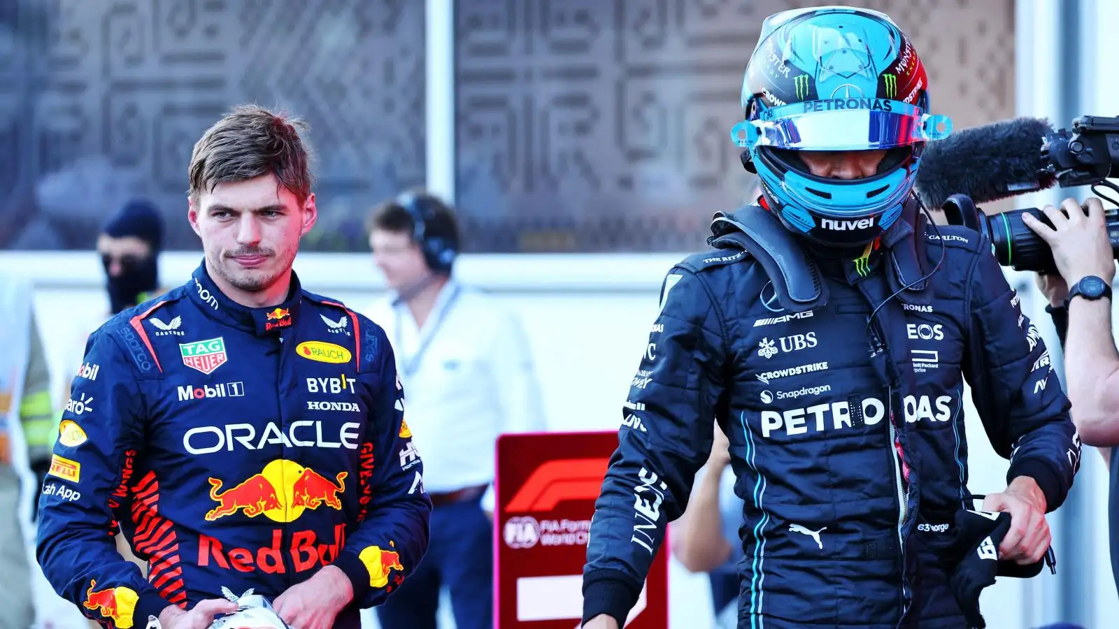 Max Verstappen looks annoyed after speaking with George Russell. Baku. April 2023.