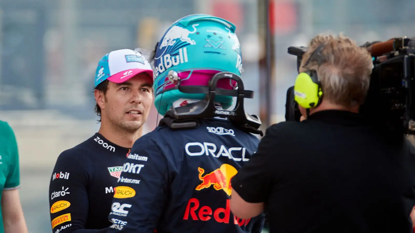 Max Verstappen congratulates his Red Bull team-mate Sergio Perez. Miami May 2023