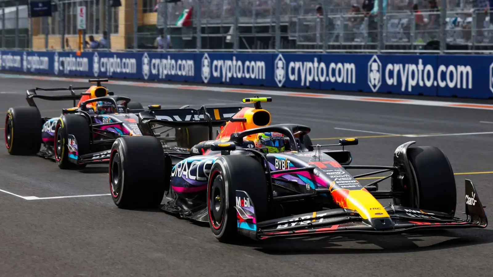 Sergio Perez with Max Verstappen behind in the race. Miami May 2023.