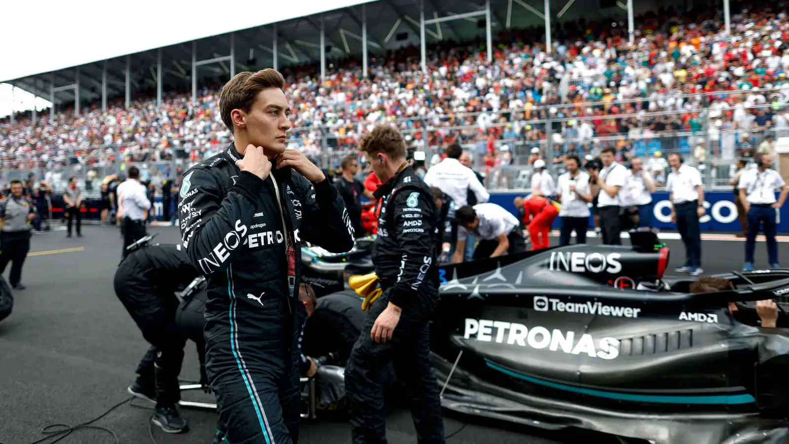 George Russell walking to his Mercedes W14 on the grid. Miami May 2023
