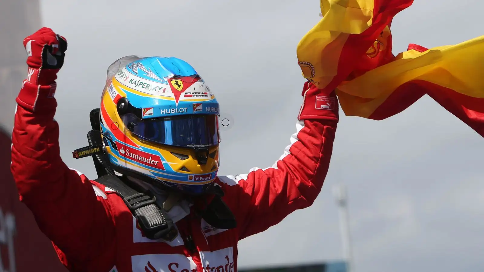 Ferrari driver Fernando Alonso celebrates his victory at the Spanish Grand Prix. Barcelona, 2013.