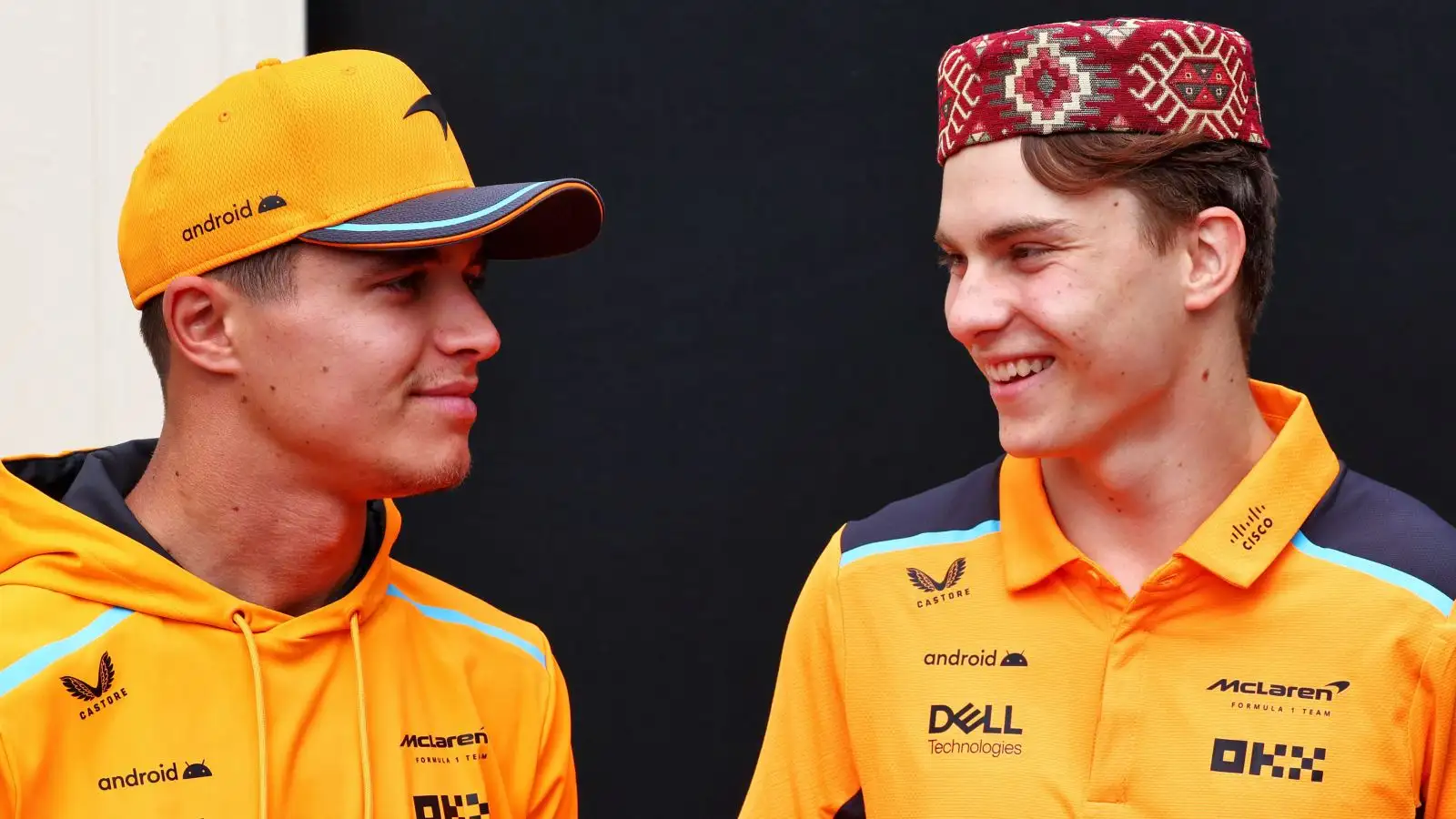 McLaren drivers Lando Norris and Oscar Piastri have fun in the paddock ahead of the Azerbaijan Grand Prix. Baku, 2023.