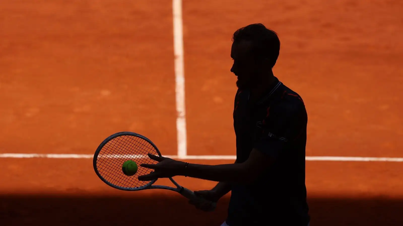A silhouette of tennis star (and future F1 driver?) Daniil Medvedev at the Madrid Open. Madrid, May 2023.