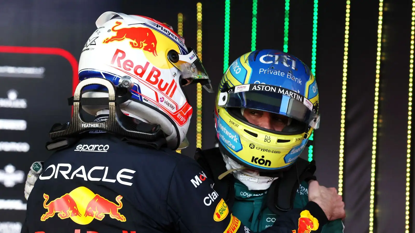 Red Bull driver Max Verstappen congratulates Aston Martin's Fernando Alonso ahead of the Australian Grand Prix podium ceremony. Melbourne, 2023.