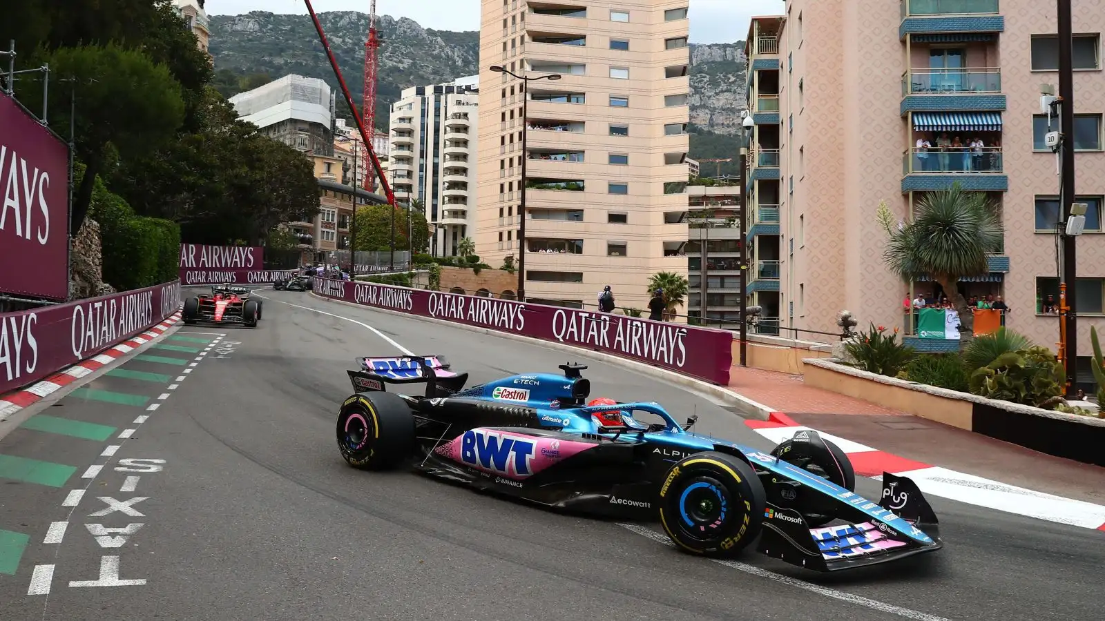 Alpine driver Esteban Ocon leads Ferrari's Carlos Sainz and Mercedes' Lewis Hamilton in the early stages of the Monaco Grand Prix. Monte Carlo, May 2023.