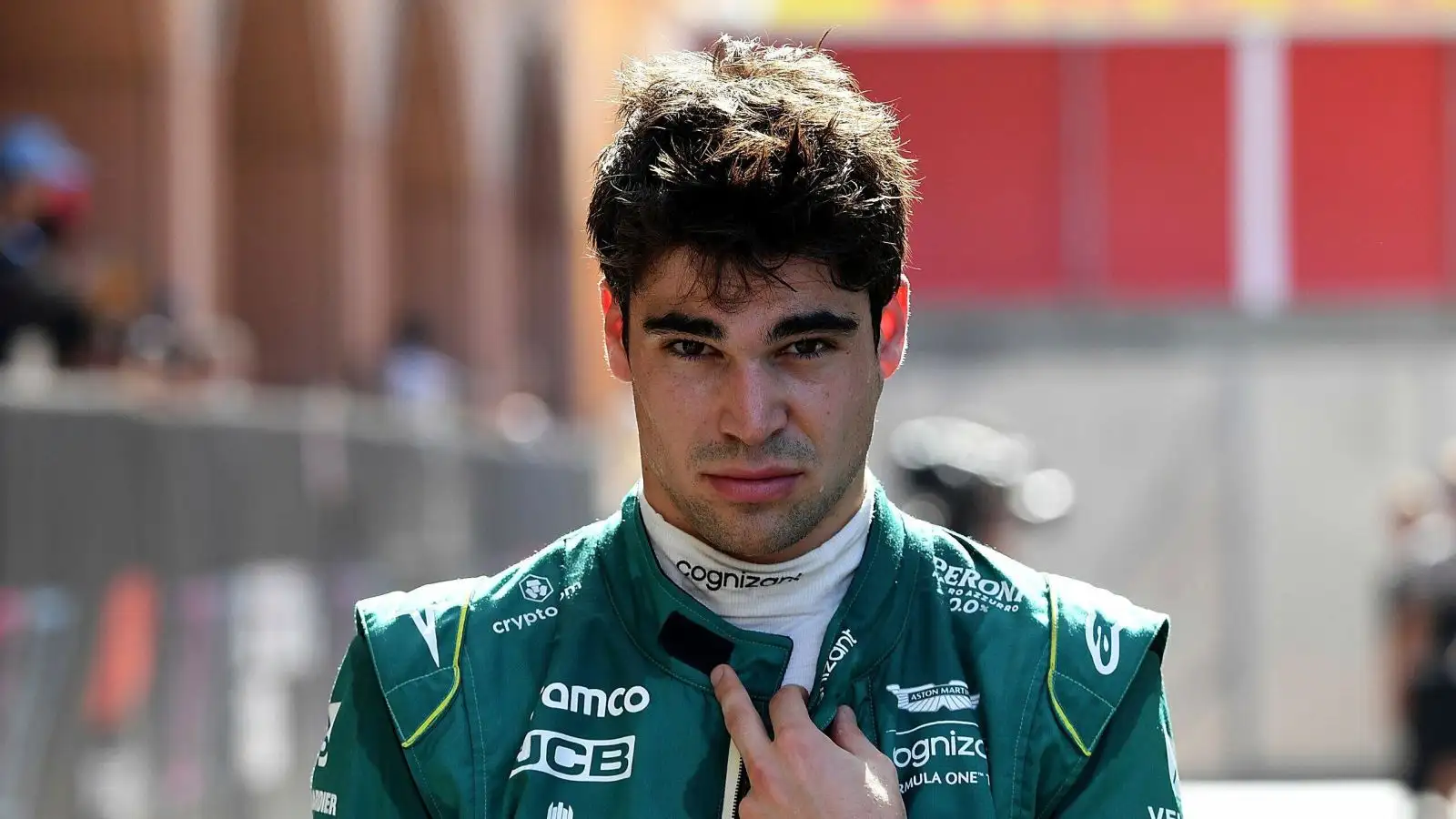 Aston Martin driver Lance Stroll looks thrilled as he makes his way through the paddock at the Monaco Grand Prix. Monte Carlo, 2023.