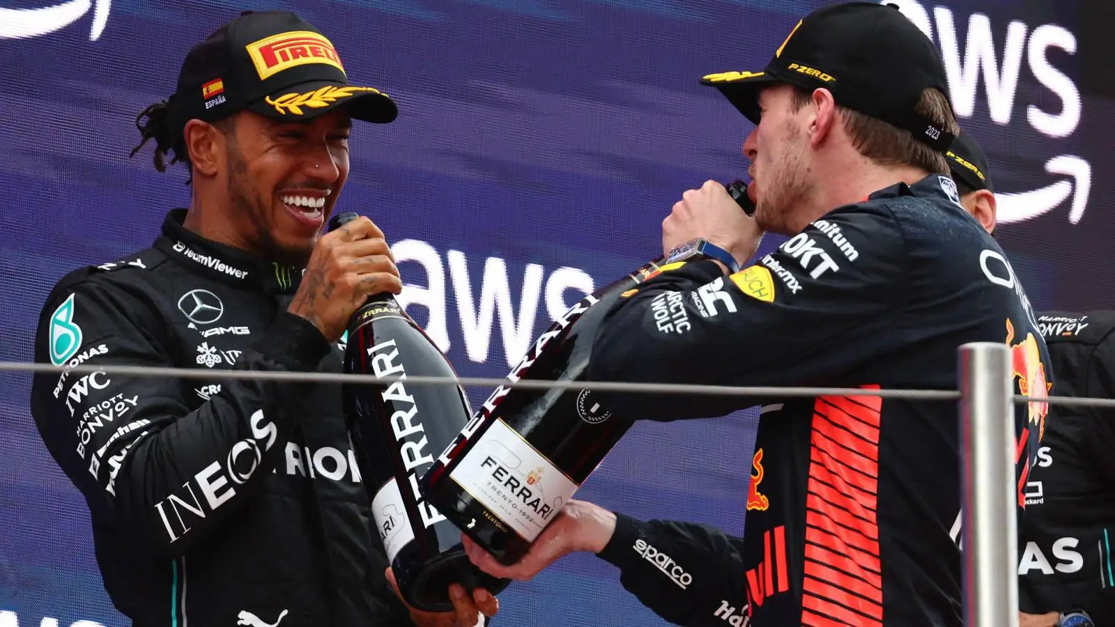 Lewis Hamilton, Mercedes, and Max Verstappen, Red Bull, smile. Spain, June 2023.