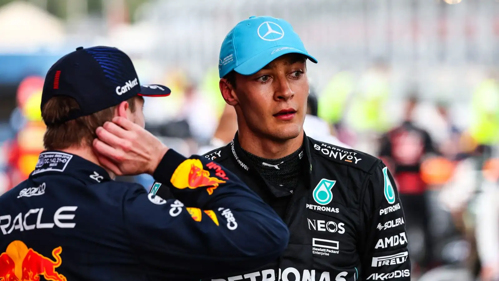 George Russell speaking with Max Verstappen after the race. Spain June 2023