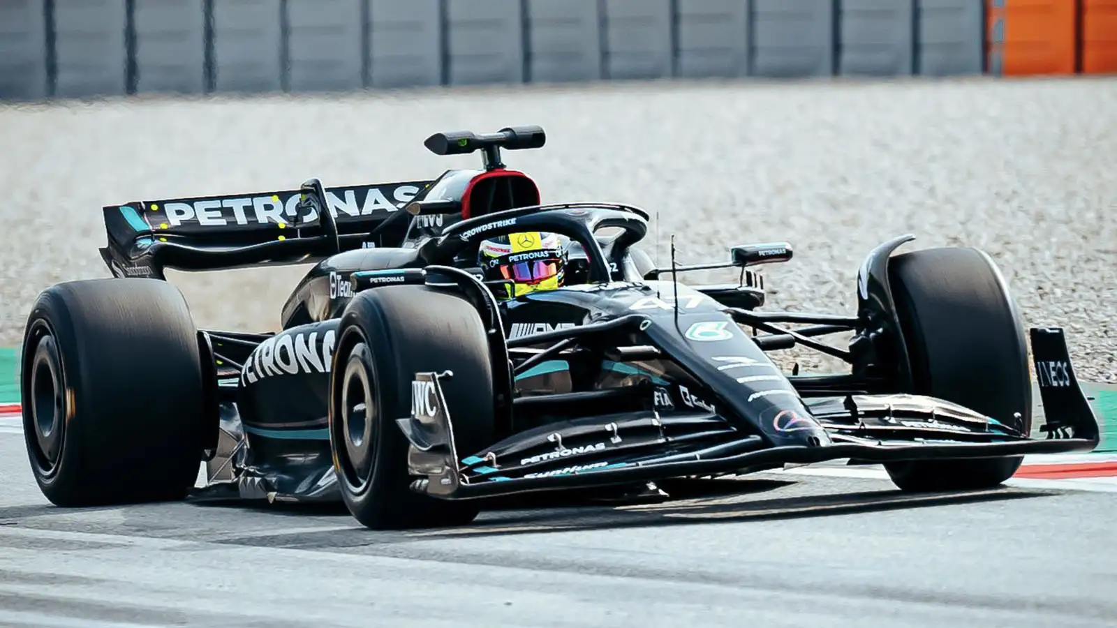 Mick Schumacher drives Mercedes W14 in Barcelona, 2022.