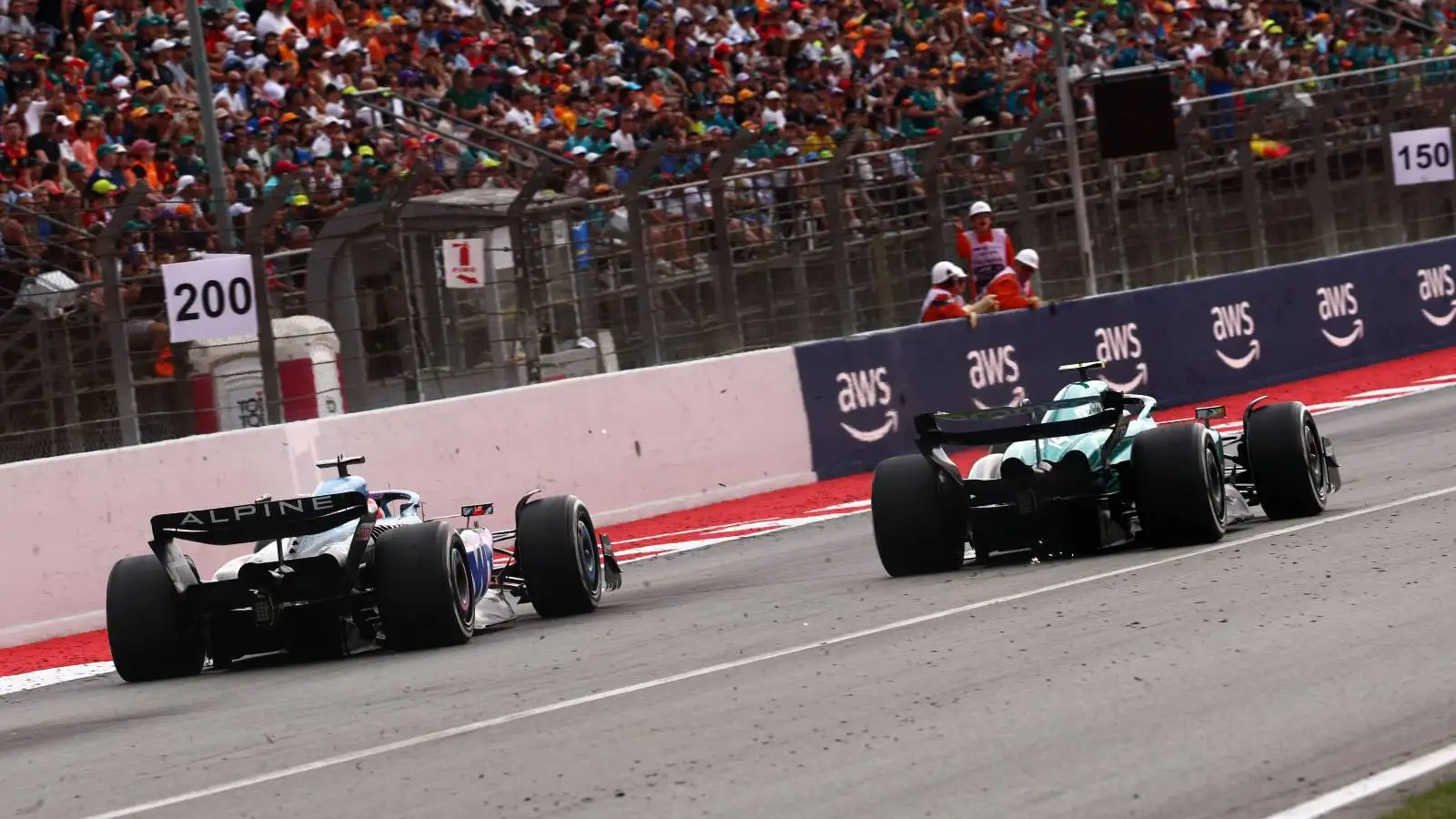 Esteban Ocon, Alpine and Fernando Alonso, Aston Martin, battle. Spain, June 2023.