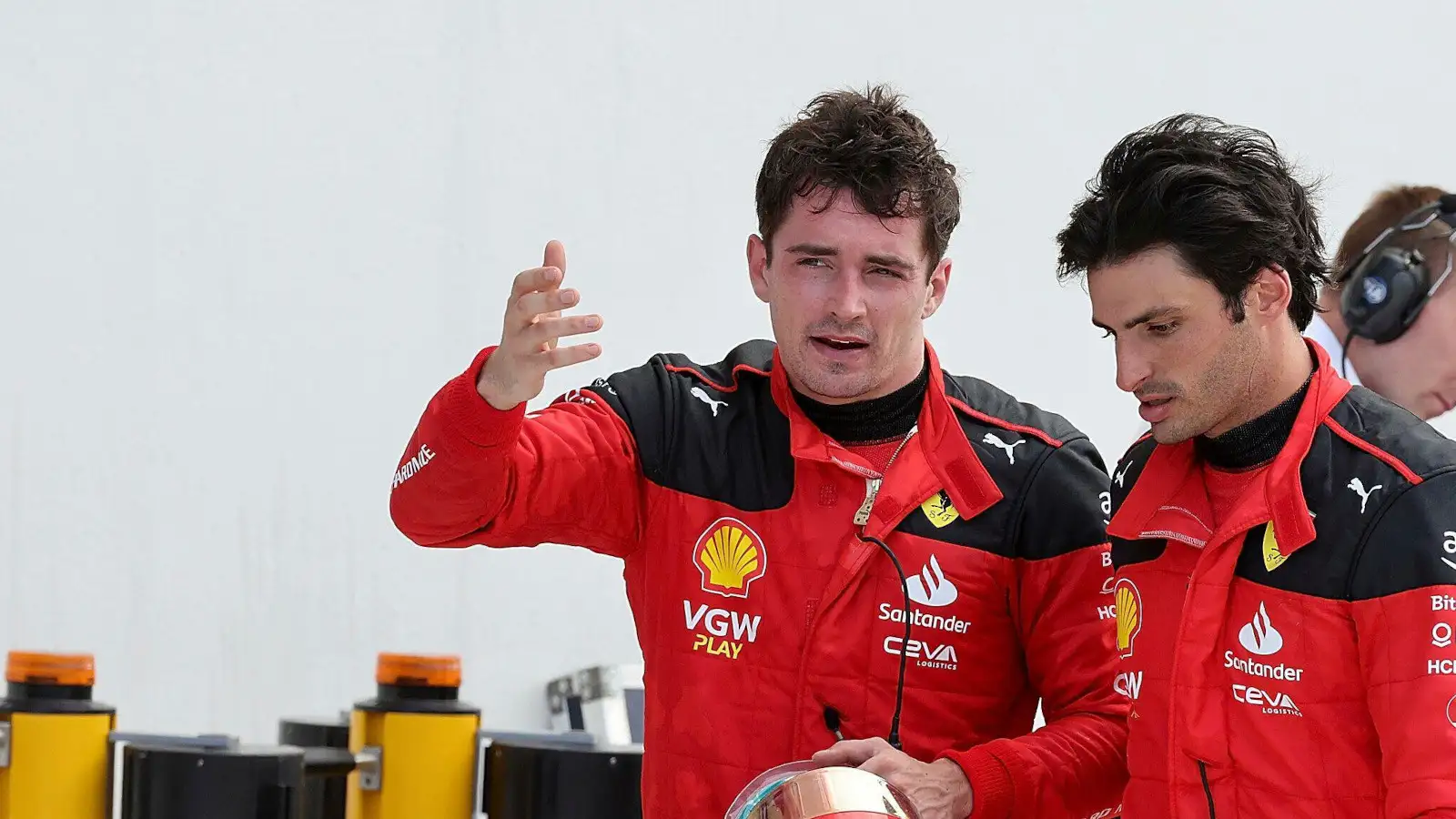 Charles Leclerc and Carlos Sainz speaking, neither happy. Miami May 2023