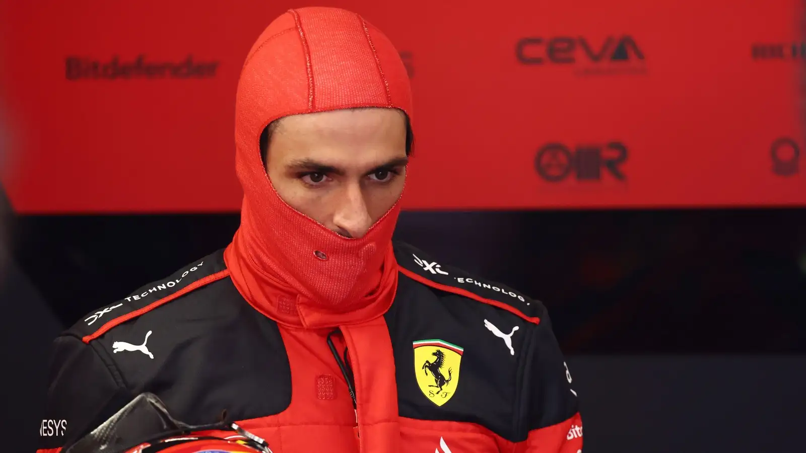 Carlos Sainz looks down while wearing his balaclava. Montreal, Canada. June 2023.