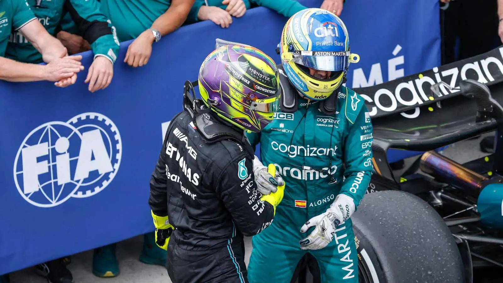 Fernando Alonso and Lewis Hamilton shake hands. Canada June 2023.