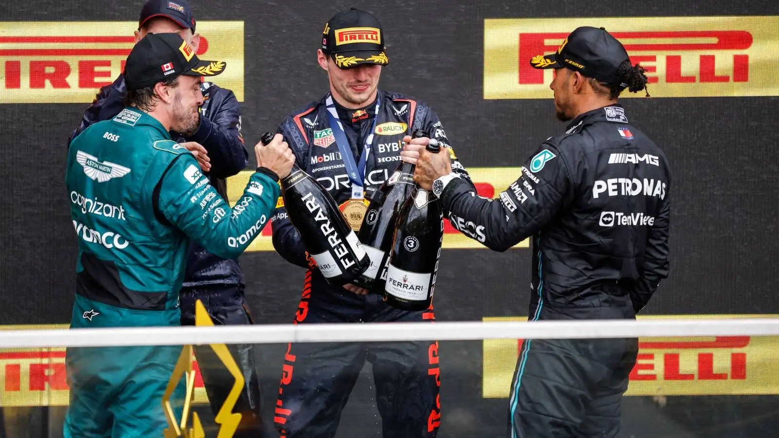 Fernando Alonso, Max Verstappen and Lewis Hamilton on the podium. Canada, June 2023.