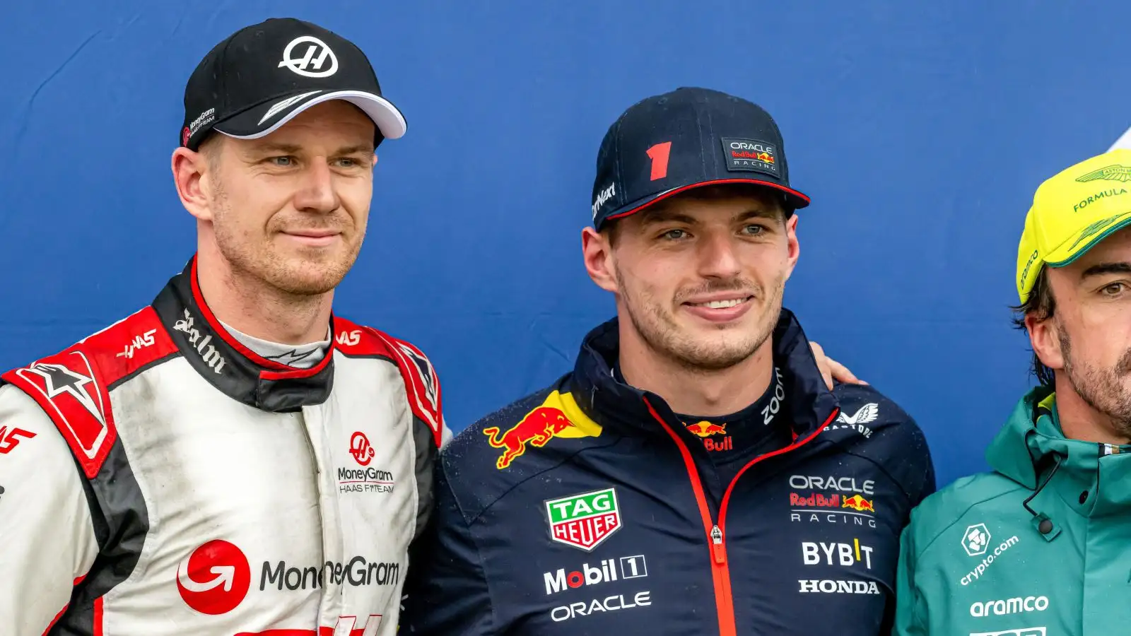 Nico Hulkenberg (Haas) and Max Verstappen (Red Bull) pose after qualifying in the top three for the Canadian Grand Prix. Montreal, June 2023.