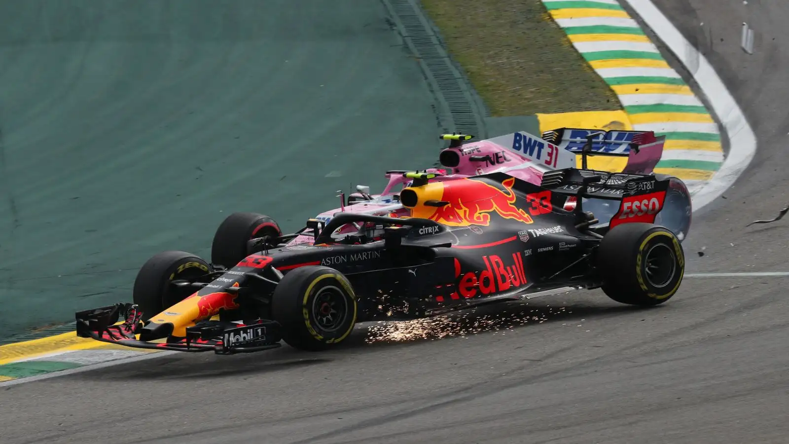 Max Verstappen (Red Bull) collides with Esteban Ocon (Racing Point Force India) in an infamous Brazilian Grand Prix moment. Sao Paulo, November 2018.
