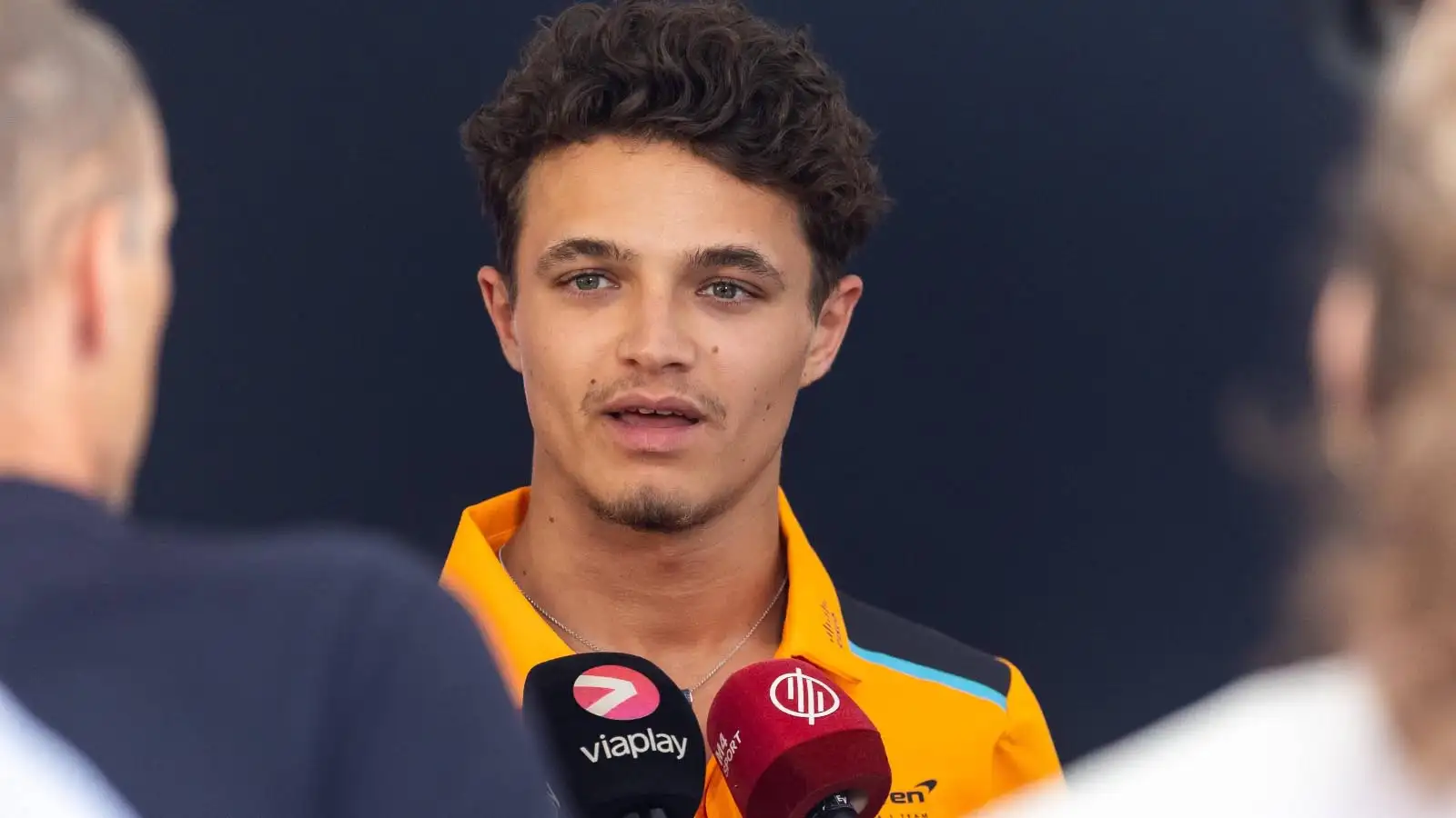 Lando Norris speaks to the media in Austria.