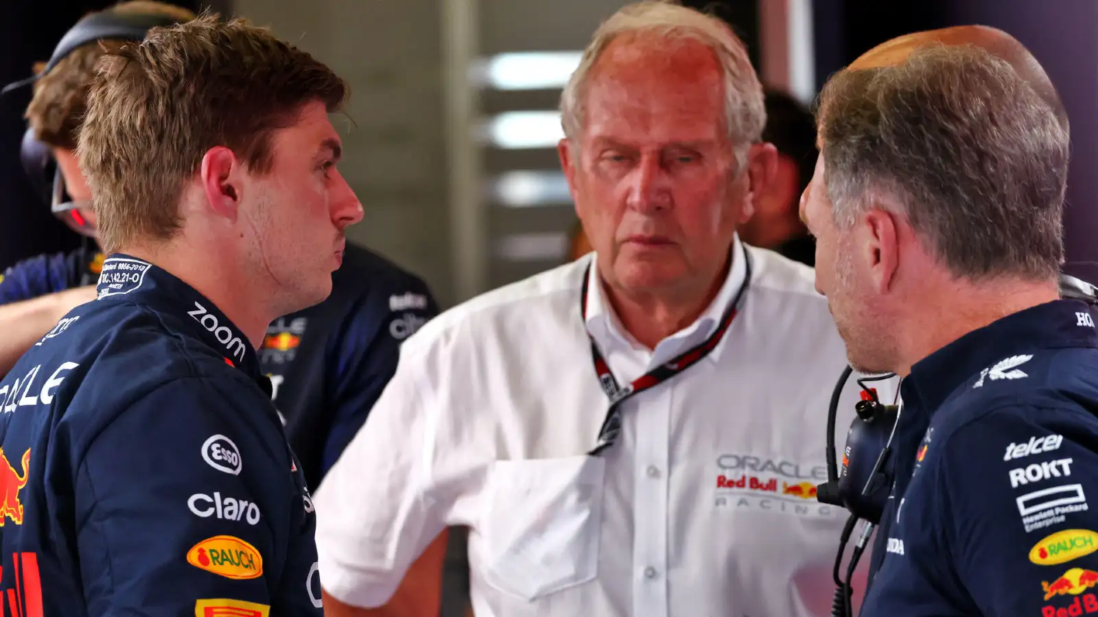 Red Bull driver Max Verstappen in conversation with Christian Horner and Helmut Marko at the Austrian Grand Prix.