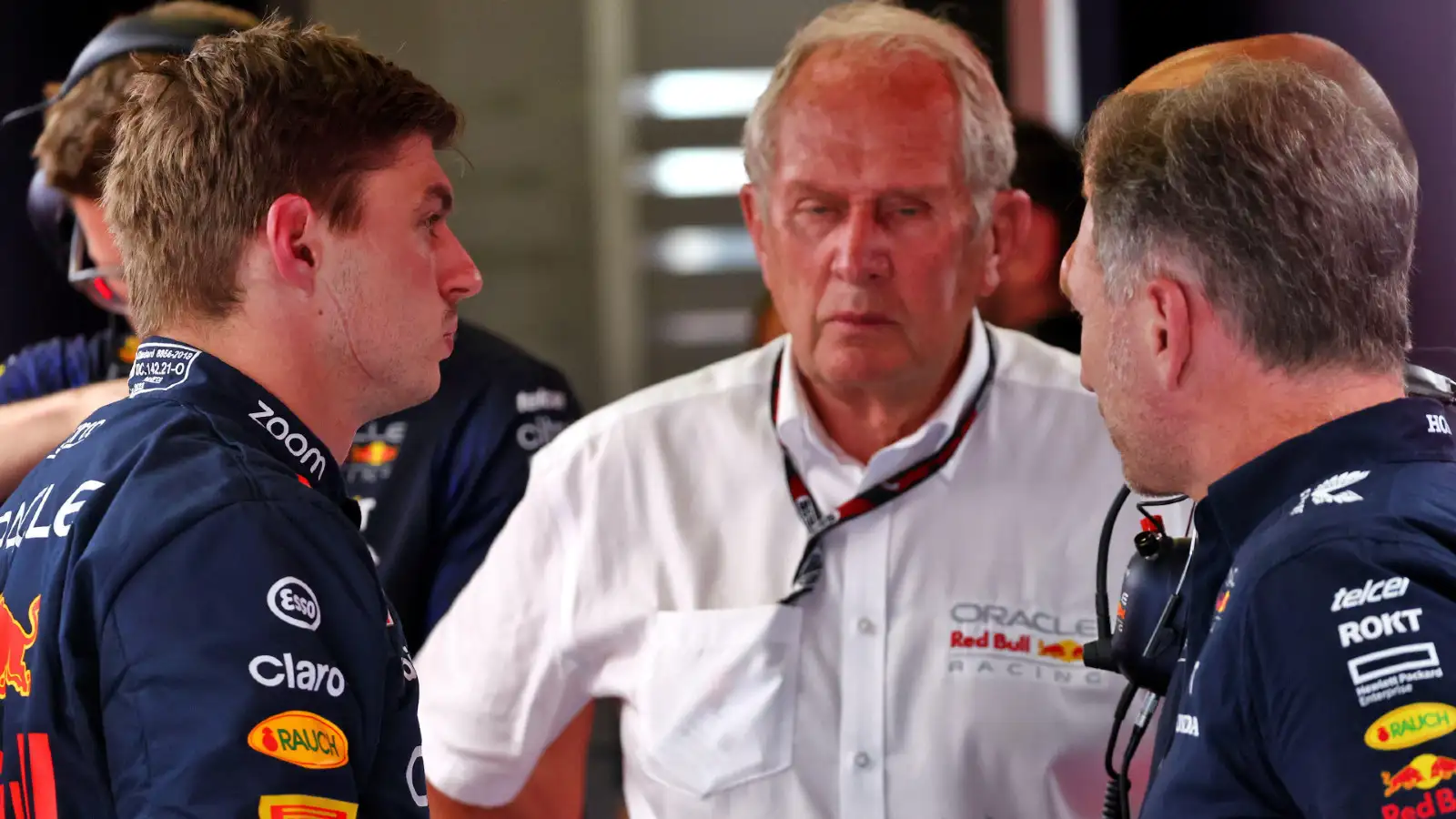 Red Bull driver Max Verstappen in conversation with Christian Horner and Helmut Marko at the Austrian Grand Prix. Spielberg, July 2023.