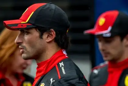Carlos Sainz looks into the distance as Ferrari team-mate Charles Leclerc lurks in the background at the Austrian Grand Prix. Styria, July 2023.