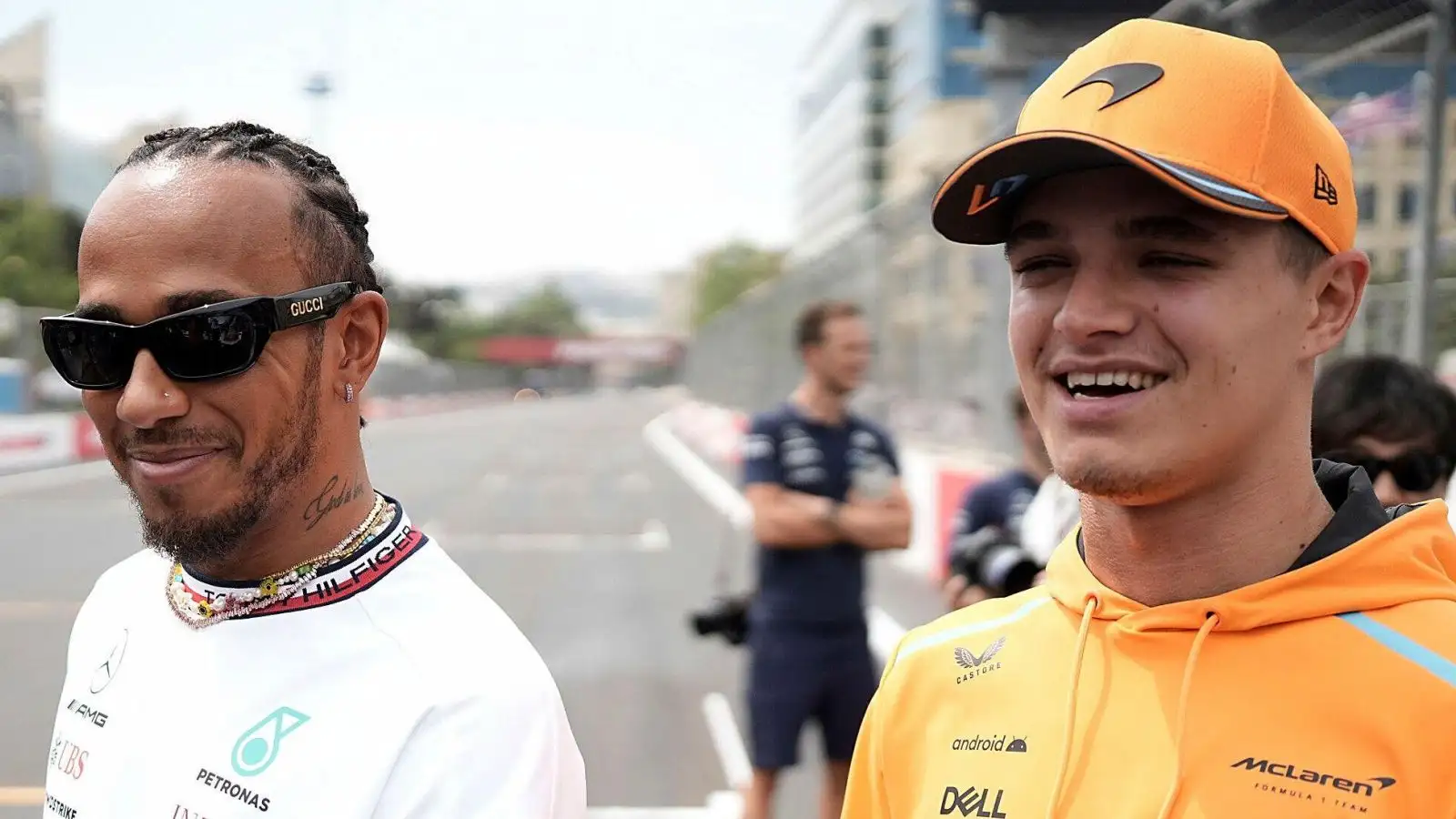 Lewis Hamilton (Mercedes) and Lando Norris (McLaren) share a joke at the 2023 Azerbaijan Grand Prix.