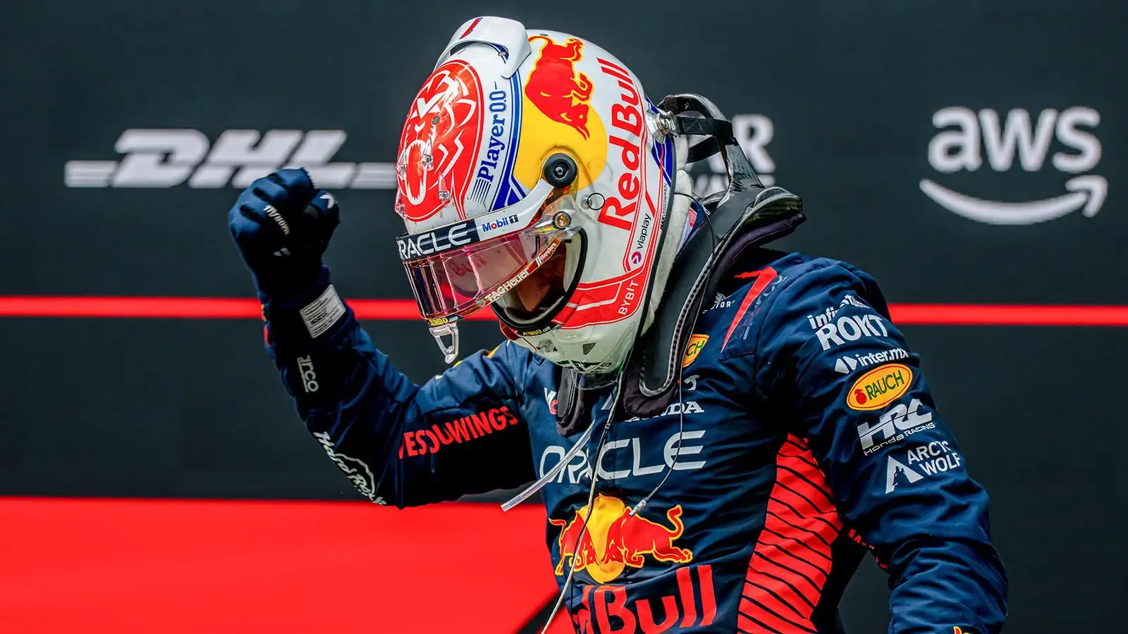 Max Verstappen celebrates moments after winning the Austrian Grand Prix.