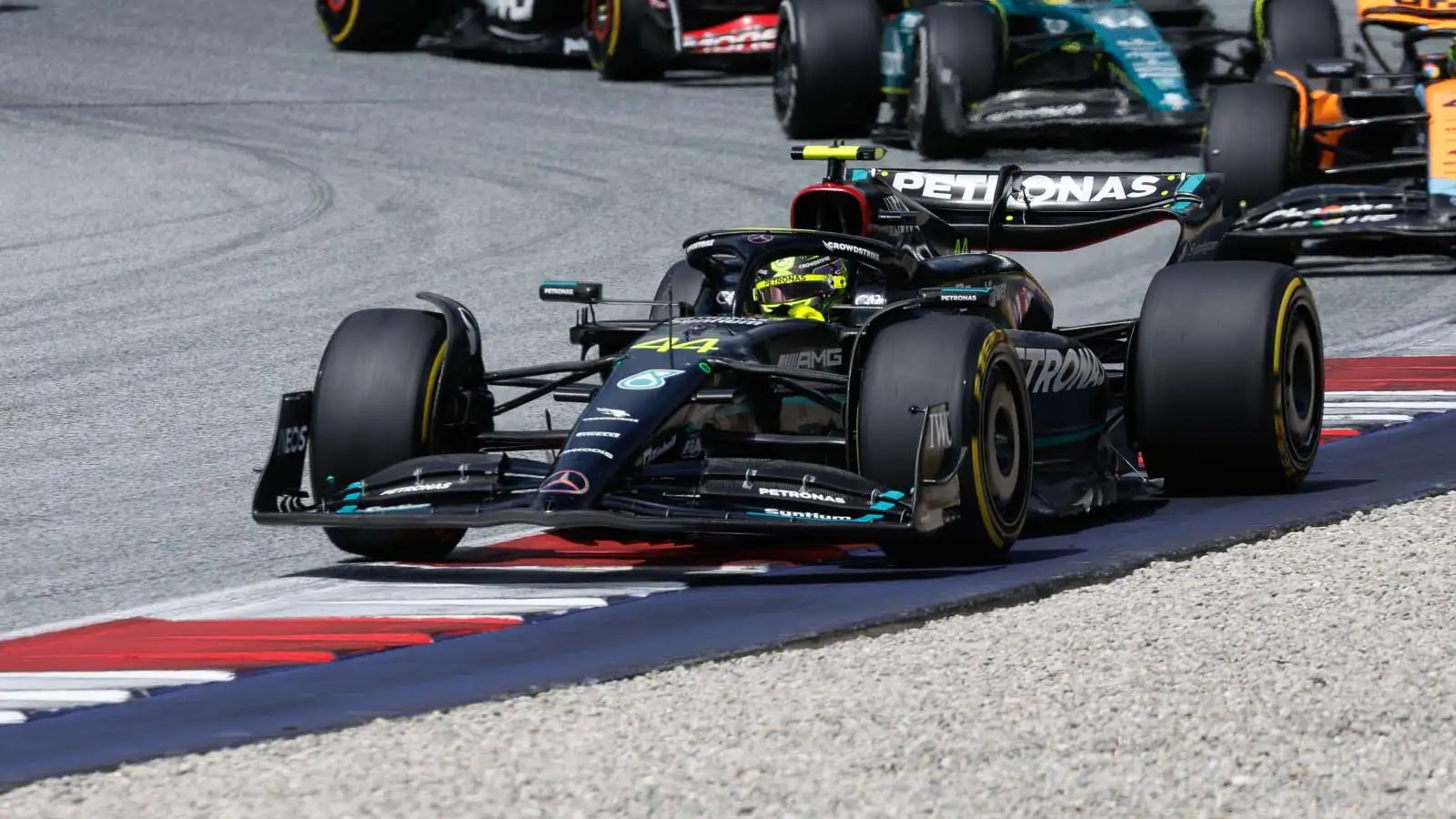 Lewis Hamilton exits Turn 4. Austria June 2023.